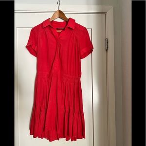 Fun and flirty red dress. French designer